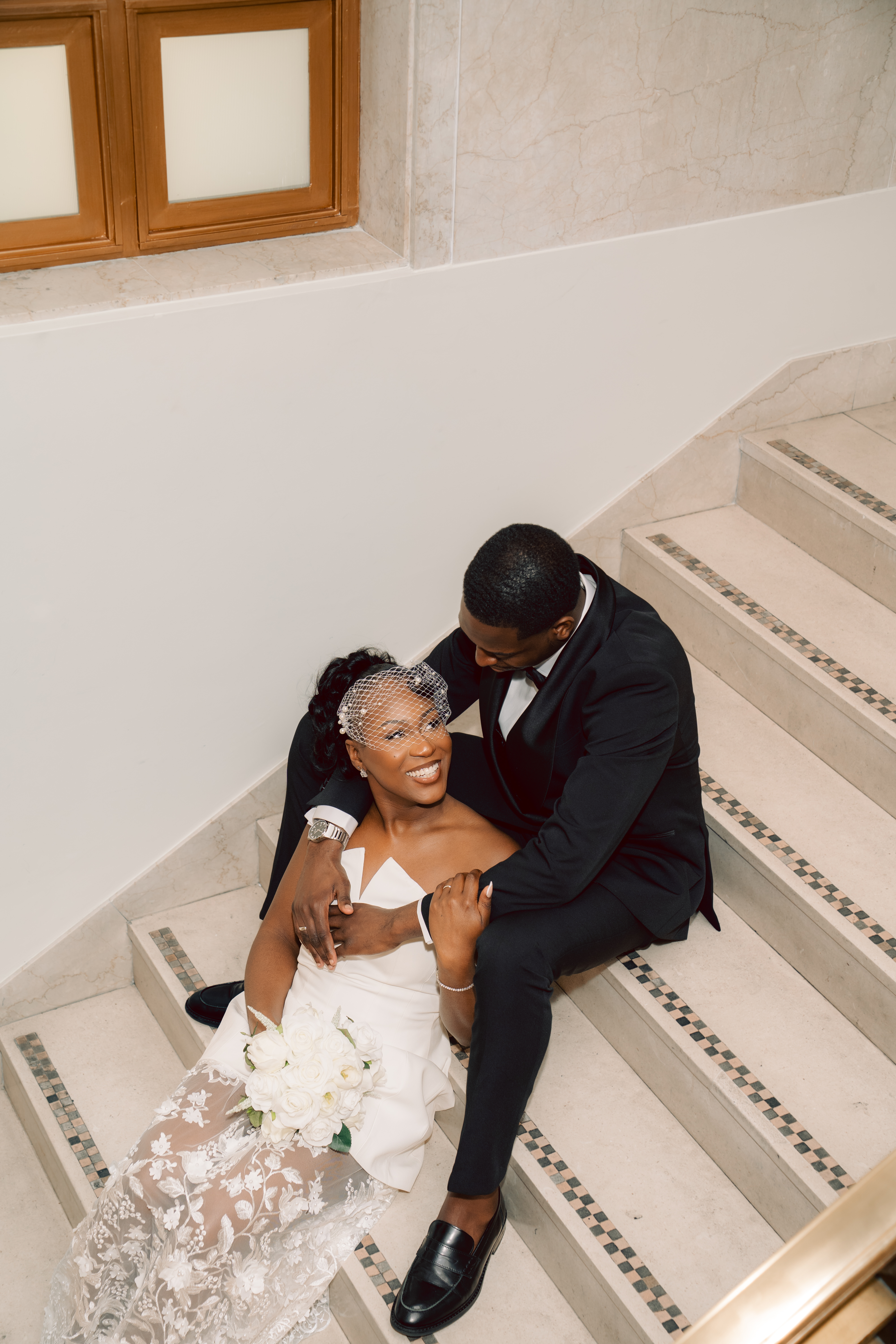 Samson and Christina in formal attire